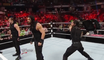 Gif Seth attacks Roman with chair
