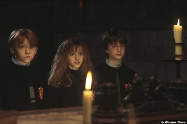 Harry Potter and the Philosophers Stone: Rupert Grint, Emma Watson and Daniel Radcliffe as Ron Weasley Hermione Granger and Harry Potter